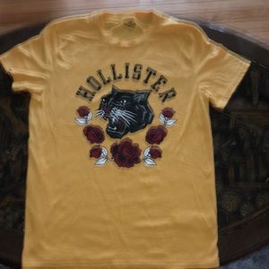 Comfortable Yellow with puma /roses print tshirt